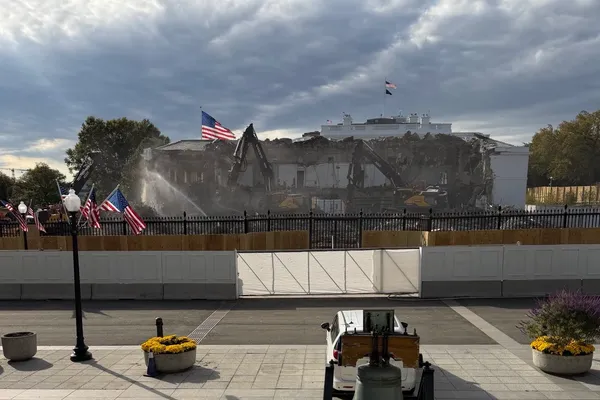 Demolition of the White House East Wing in October 2025, with construction equipment and exposed framing.