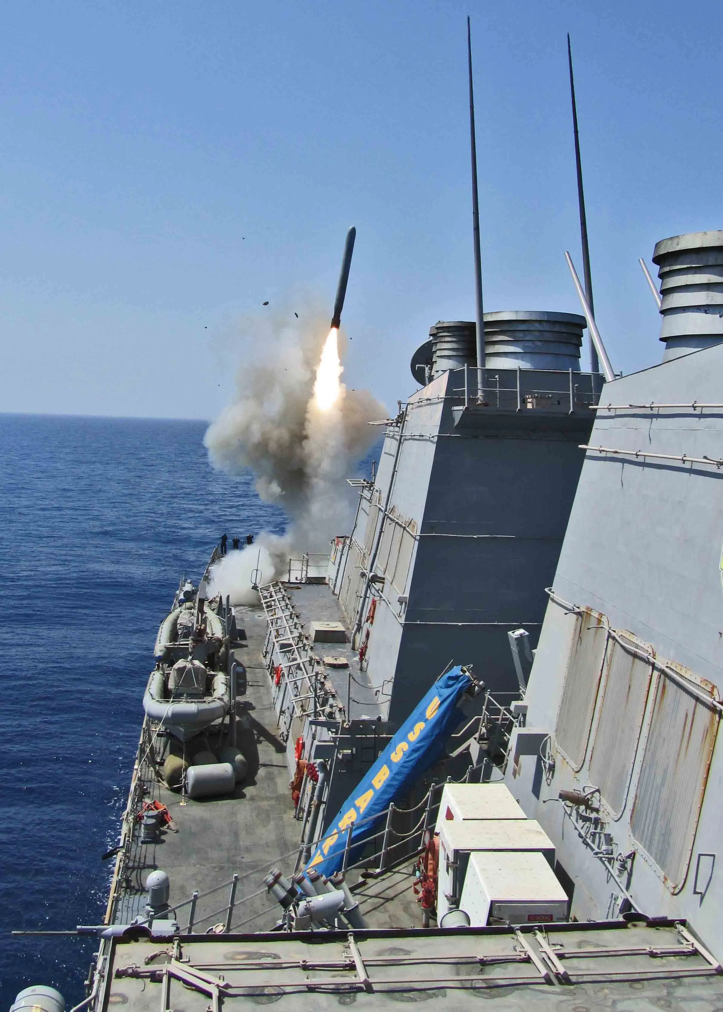A US Navy Arleigh Burke-class destroyer launching a Tomahawk cruise missile, the weapon used in the Nigeria strike.