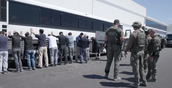 ICE agents at a federal enforcement operation